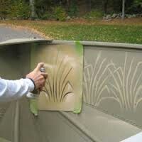 a man is drawing on the side of a bench