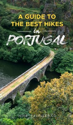 a bridge over a river in portugal with the text, a guide to the best hikes in portugal