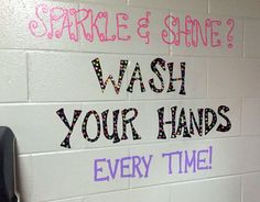 a white wall with writing on it that says space and shine wash your hands every time