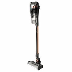 the cordless vacuum is on display with its handle extended and it's head up