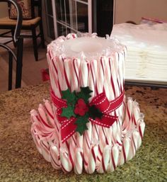 a candy cane christmas hat sitting on top of a counter