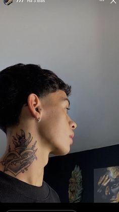 a person with tattoos on their neck and back