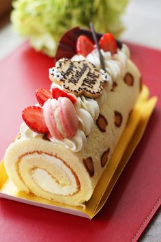 a piece of cake sitting on top of a red plate