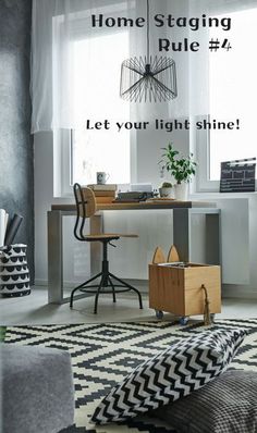 a living room with a desk and chair next to a window that says home staging rue 4 let your light shine