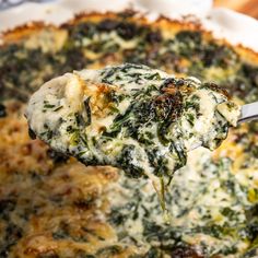 a spoonful of spinach and cheese casserole