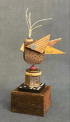 Reclaimed wood bird sculpture with dominos, old yard sticks and other found objects. Scrap Wood Art, Recycle Sculpture, Fish Sculpture, Found Objects