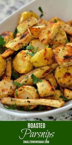 roasted parmesan potatoes in a white bowl