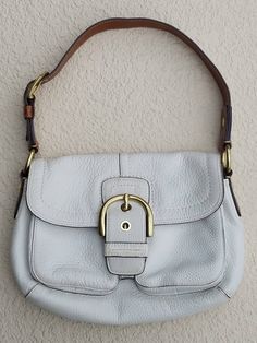 Beautiful White Leather Vintage COACH Shoulder Bag!! Are you tired of your old purse? Do you like quality leather that last forever? Then this COACH purse is for you.  -High quality leather -Well known brand -Elegant & Classy And... We also offer fast and free shipping! Condition is Pre-owned, good with light wear!