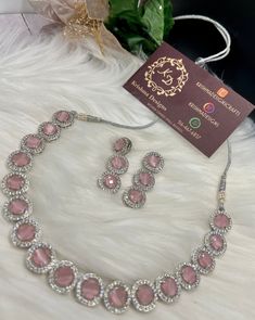 Beautiful Bridal Ad Necklace set. Perfect engagment set, bridal set, eid jewelry.Pink, Maroon, Emerald,Mint Ad diamond look set. Material- American Diamond. Color Avavilable  - Mint -Pink -Maroon - Emerald Green High End Quality 100% Satisfaction Guarantee: Long Lasting Plating, High-Quality Stones. Perfect for any occassion- weddings, partywear Jewelry. Care: It is advisable that you keep our products away from direct heat, humidity, and moisture.Please do not use Perfume on the products. Please Follow us on Instagram: https://instagram.com/krishmadesigns?utm_medium=copy_link Note: Free Shipping over $75. Contact us for any question! S.no-394 Elegant Pink Jewelry Sets For Diwali, Bridal Round Necklace With Stone Work, Round Bridal Necklace With Stone Work, Hand-set Cubic Zirconia Party Sets, Kundan Necklace With American Diamond For Wedding, Pink Bridal Sets For Party, Pink Bridal Sets For Party And Festive Occasions, Elegant Pink Bridal Sets For Party, Festive Pink Bridal Sets For Party