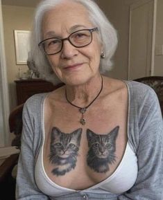 an older woman with tattoos on her chest