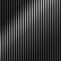 a black and white photo with vertical lines