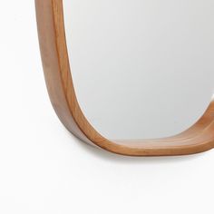 This delightful rectangular wall mirror adds a modern, minimalist feel to your space. It is handcrafted from rubber wood with a soft curved frame and subtle changes in the texture of the frame, giving each mirror a different pattern. This mirror has a unique structure with a narrow edge width and accentuated profile depth. It's a great addition to any area of your bedroom, living room, entryway, or bathroom, and the three-dimensional design brings depth and light to any space, creating a contemp Rectangle Wall Mirror, Rectangular Wall Mirror, Mirror Panel, Living Room Entryway, Rounded Rectangle, Oval Mirror, Wall Mounted Mirror, Glass Panels, Dorm Decorations