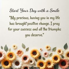 flowers and leaves are arranged in front of a card that says, start your day with a smile