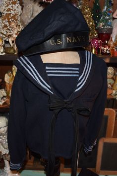 Vintage Sailor Suit and Hat / Childs Blue Navy Suit / Good Lad Tailored Navy Blue Suit Adorable navy suit with hat and tie. I believe its 1950's . The tag states Goodlad Tailored. It has a hole that needs repair and a broken button. But comes with tie and original hat. Tag states size 5. Otherwise in good vintage condition. Approx. 5  Long: 22" Pants, Waist Elastic 9" Shoulders. 10 1/2 " Chest. 13 3/4 " Sleeves: 13 " This is a vintage item , sold as is with its original charm and patina. Vintage Sailor Outfit Men, 1700s Sailor, 1940s Sailor Man, Hms Pinafore, Baby Sailor Outfit, Vintage Sailor, Sailor Suit, Navy Blue Suit, Navy Suit