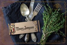 a table setting with silverware and a sign that says marry jameson on it