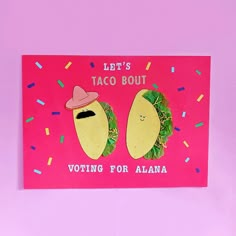 a pink card with two tacos on it