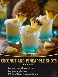 there are three glasses with pineapple shots in them