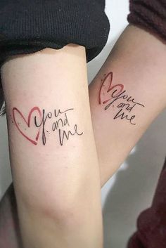 two people with matching tattoos on their arms that say, you're one and me