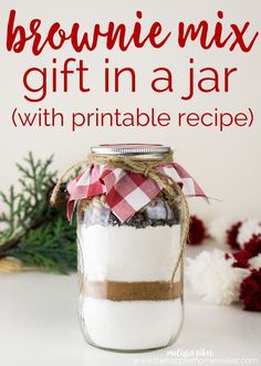 a jar filled with brownie mix sitting on top of a table