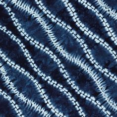 an image of a blue and white tie dye pattern that looks like something out of space