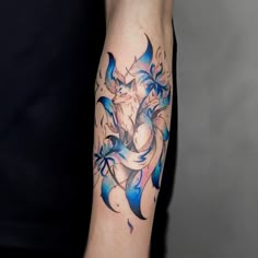 a person with a tattoo on their arm