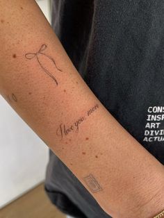 a person with a tattoo on their arm