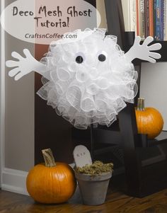 a halloween decoration made to look like a ghost