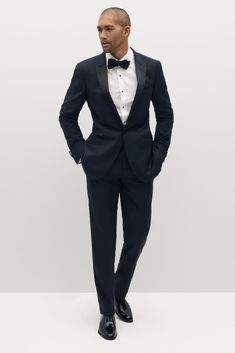 Limited Edition Style: We’ve reached the pinnacle of style with the peak lapel tuxedo, Italian-made and crafted from 100% merino wool. Sleek black, clean design, and an updated lapel come together to bring modern flair to the traditional tuxedo. Satin detailing on the lapel, waistband, and pant seam complete the look. Luxury Long Sleeve Tuxedo For Black-tie Events, Elegant Custom Fit Long Sleeve Tuxedo, Tuxedo Blazer For Black-tie Gala Events, Fitted Long Sleeve Tuxedo For Black Tie Events, Custom Fit Tuxedo Blazer For Black-tie Events, Elegant Long Sleeve Suits For Black-tie Events, Elegant Single Breasted Blazer For Black-tie Events, Semi-formal Notch Lapel Blazer For Gala, Elegant Single-breasted Blazer For Black-tie Events