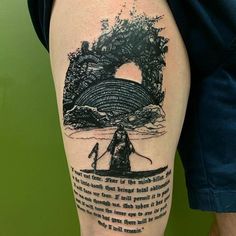 a man with a tattoo on his leg has a quote from the lord of the rings