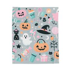 a halloween themed napkin with lots of different items on it, including candy and candies