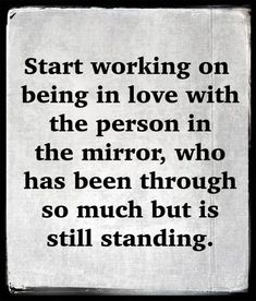 a black and white photo with the words start working on being in love with the person in the mirror who has been through so much but is still standing