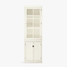 a white bookcase with doors and drawers on the front, against a white background