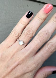 A lovely elegant small moonstone moonstone has been set in a sterling silver serrated bezel with a handmade ring band from sterling silver half dome wire. This dainty 6mm round moonstone has lovely hues of blues and hints of oranges and pinks throughout when the light hits it just right. The setting gives this ring a little bit of edge while still being minimalistic and elegant. Made to order! Each moonstone will vary slightly in coloration, hues, and flash.Moonstone is the birthstone for June! Sterling Silver Birthstone Ring, Boho Engagement Ring, Boho Engagement, Gel Glue, Ring Moonstone, Ring Boho, False Nail, Half Dome, Asheville Nc