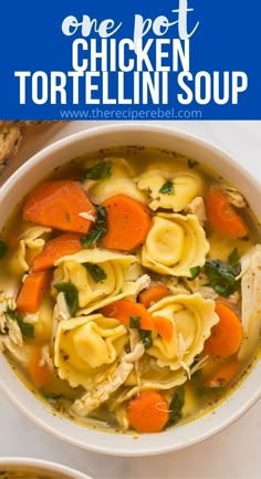 chicken tortellini soup with carrots and spinach in a white bowl