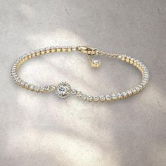 *100% Authentic *Comes With Box *Retail $177 “Level Up Your Outfit With The Sparkling Halo Tennis Bracelet. Finished In Elegant 14k Gold Plating, This Hand-Finished Piece Is Decorated With Sparkling Stones. The Centerpiece Features A Big Central Stone Surrounded By A Halo Of Clear Cubic Zirconia. There’s A Small Stone Detail At The End Of The Chain For Added Sparkle. This Tennis Bracelet Includes A Lobster Clasp For Safe Closure. Style With Other Shimmering Pandora Timeless Pieces For A Classic Pandora Wedding, Pandora Flower, Y2k Glam, Pandora Gold, Pandora Pink, Pandora Jewelry Bracelets, Snake Chain Bracelets, Pandora Style, Mesh Bracelet