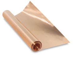 a roll of copper foil on a white background