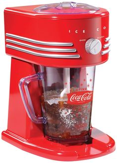 a red coca cola machine with ice in it