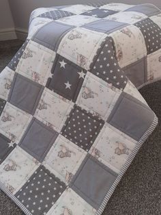 two bedspreads with stars on them in a room