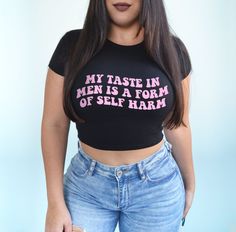 My taste in men is a form of self harm shirt. *Model is a size 6 and wearing a medium.* BABY TEE - 52% cotton / 48% polyester - Bella + Canvas brand - Micro ribbed material - Form fitting but has lots of stretch My Taste In Men, Silly Shirts, Taste In Men, Feminist Baby, Funky Clothes, Tiny Quotes, Cricket Ideas, Hot Dads