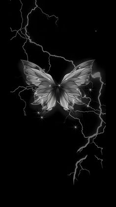 a black and white photo of a butterfly flying through the air with lightning in the background