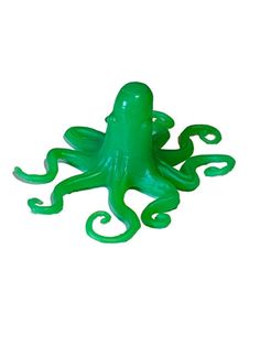 an octopus toy sitting on top of a white surface