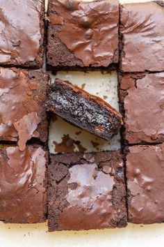 chocolate brownies cut into squares on top of each other