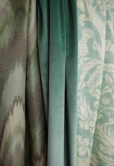 an image of curtains with different colors and patterns