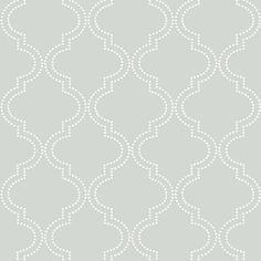 a gray and white wallpaper pattern with wavy lines on it's sides, as well as dots in the middle