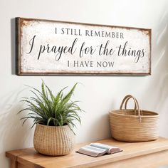 a wooden sign that says i still remember i pray for the things i have now