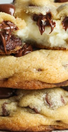 chocolate chip ice cream sandwich cookies stacked on top of each other with one bite taken out