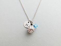 "This item is a personalized Volleyball initial charm necklace. Necklace is adorned with a volleyball charm and swarovski bead in the color of your choice. Stamped initial pendant measures approximately 3/8 inch in diameter. Necklace chain is available in a silver plated brass, or a sterling silver finish. Would you like to add a personalized gift box with your order? Check out our gift wrapping options by clicking on the link below: www.etsy.com/listing/154857979 All designs and photographs ©Co Soccer Ball Necklace, Volleyball Necklace, Beaded Horseshoe, Baseball Necklace, Personalized Gold Necklace, Horseshoe Necklace, Hand Stamped Necklace, Volley Ball, Swarovski Beads