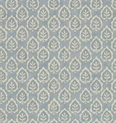 a blue and white wallpaper with an intricate design on it's surface,