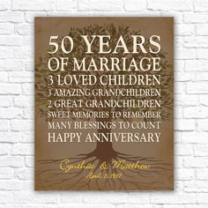 a wooden sign with the words 50 years of marriage printed on it and an image of a tree