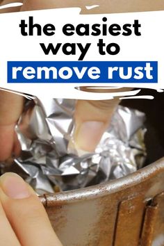 someone is removing aluminum foil from a trash can with the words, the easier way to remove rust